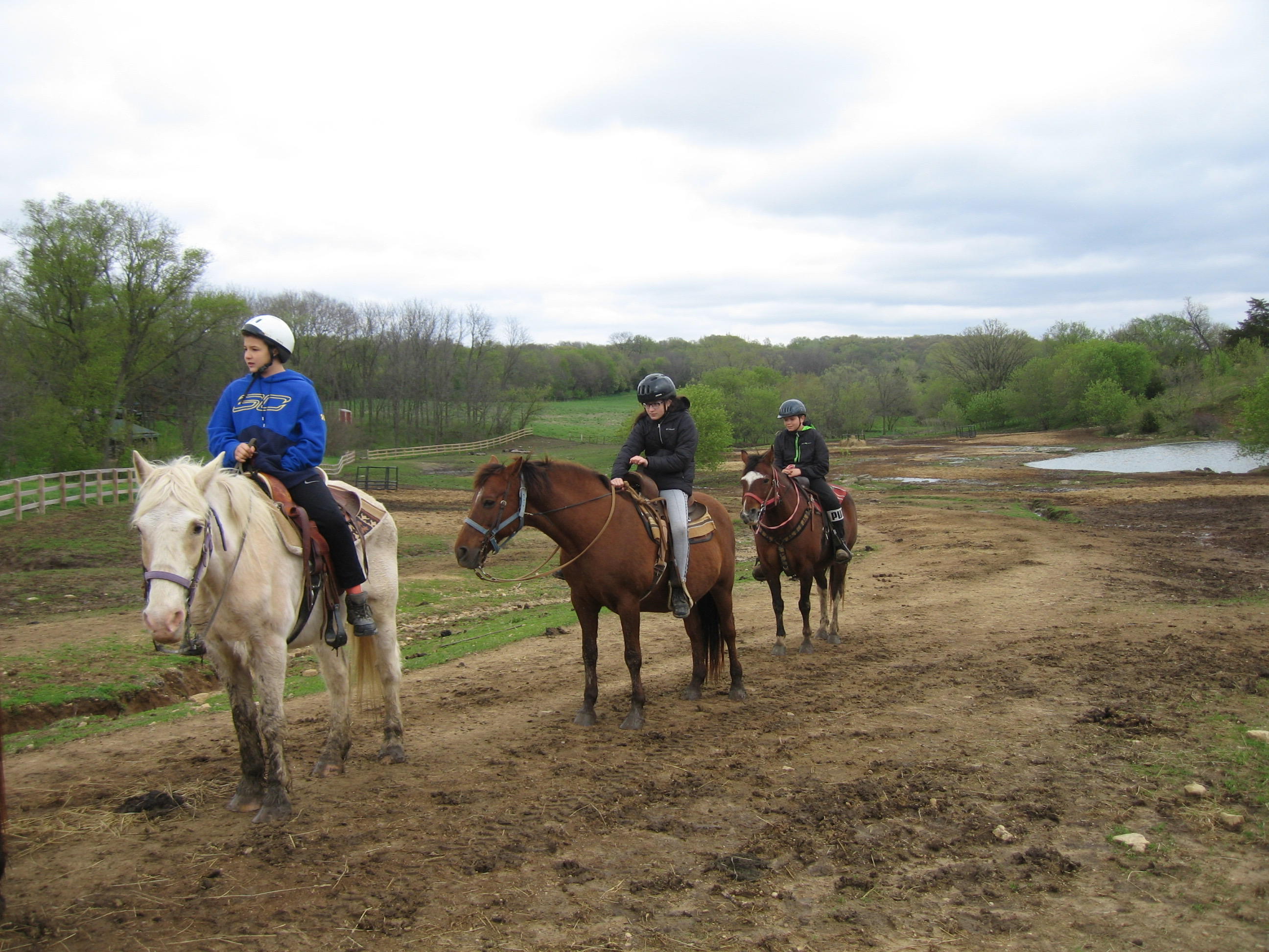 Outdoor Education Trips - Student riding horses