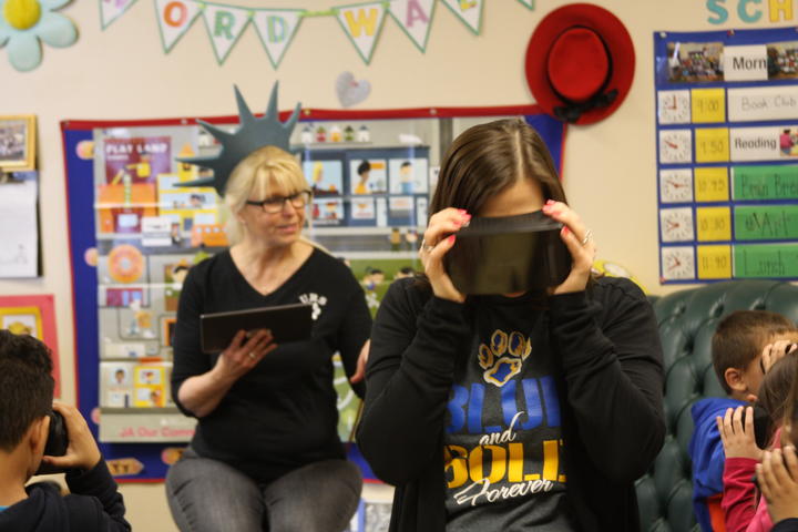 The Principal participating in Google expedition VR headset 